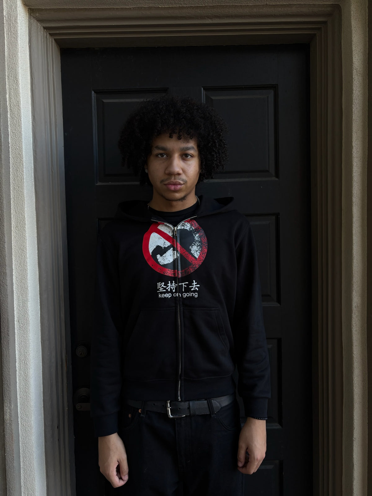 "Keep on going" zip up