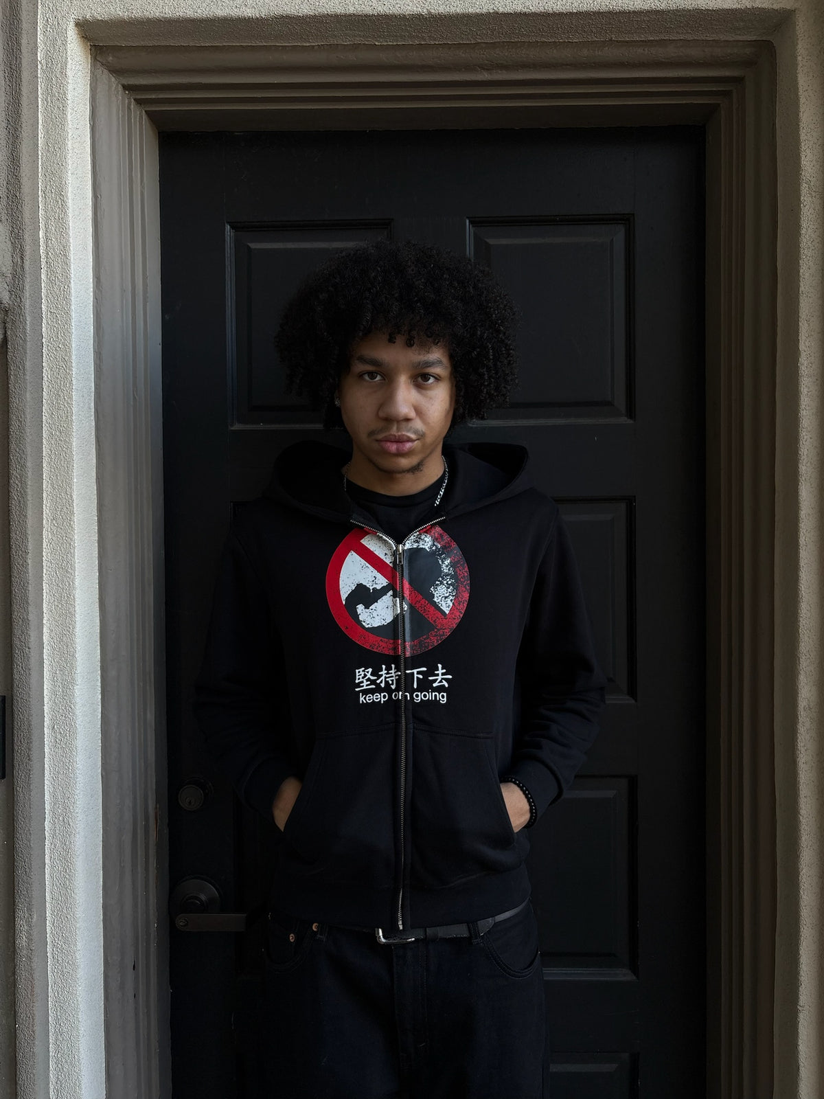 "Keep on going" zip up